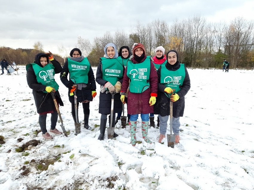 Volunteers planting trees at Newhall Park, Bierley for a Queen’s Green Canopy and Tree for Every Child planting event in November 2021.